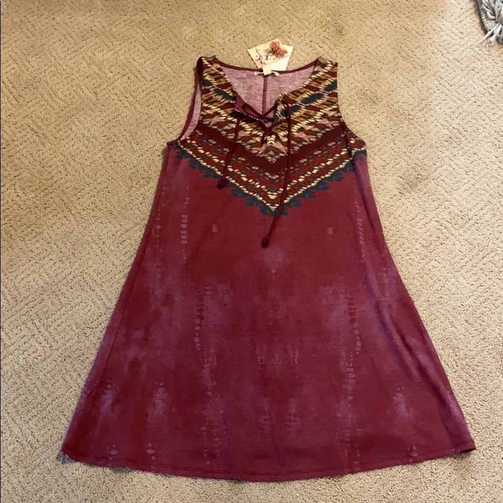 I’m selling a maroon dress.